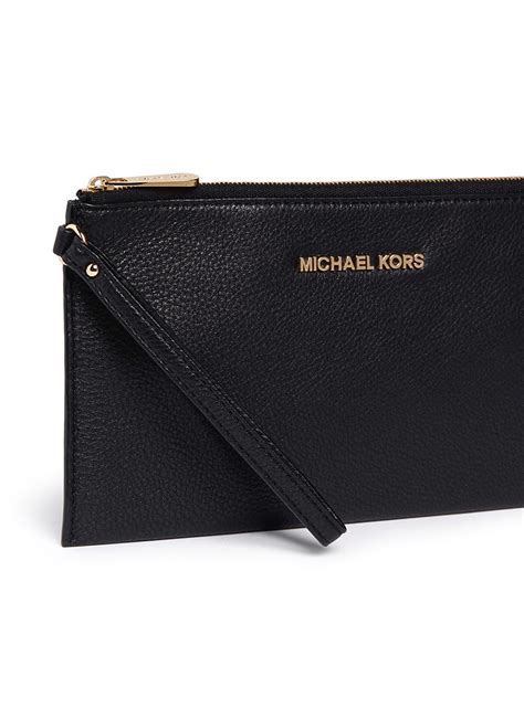 michael kors clutch ros|Michael Kors women's black clutch.